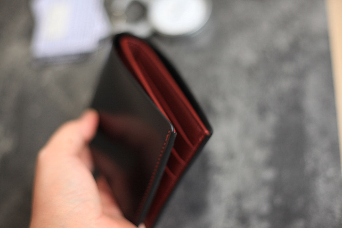 black shell cordovan relma goat leather bifold wallet