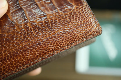 Chestnut Brown Ostrich Leather Biflod Wallet.