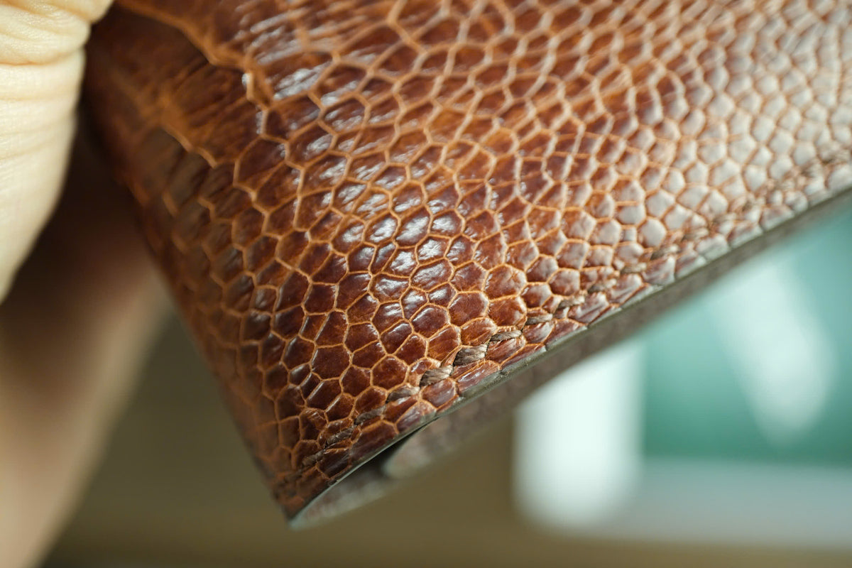 Chestnut Brown Ostrich Leather Biflod Wallet.