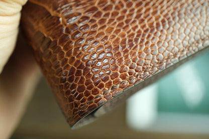 Chestnut Brown Ostrich Leather Biflod Wallet.