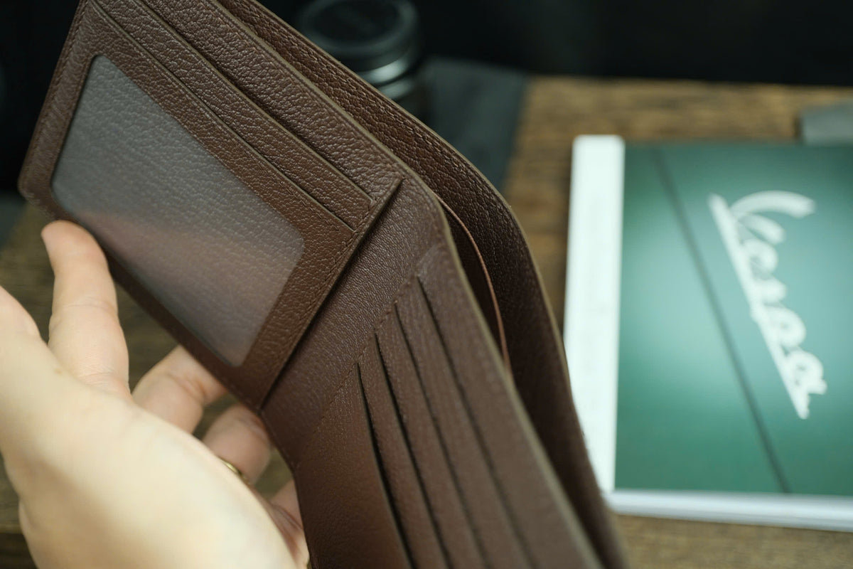 Chestnut Brown Ostrich Leather Biflod Wallet.