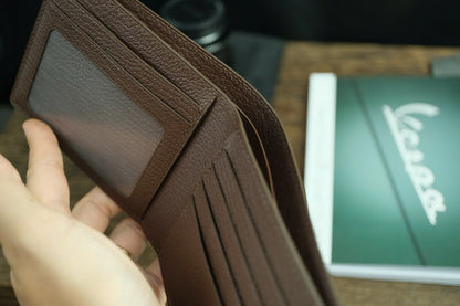 Chestnut Brown Ostrich Leather Biflod Wallet.