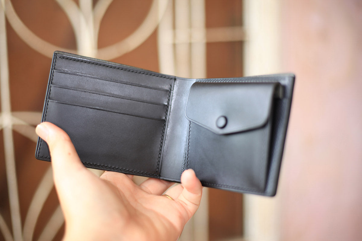 black buttero leather bifold wallet with coin pocket