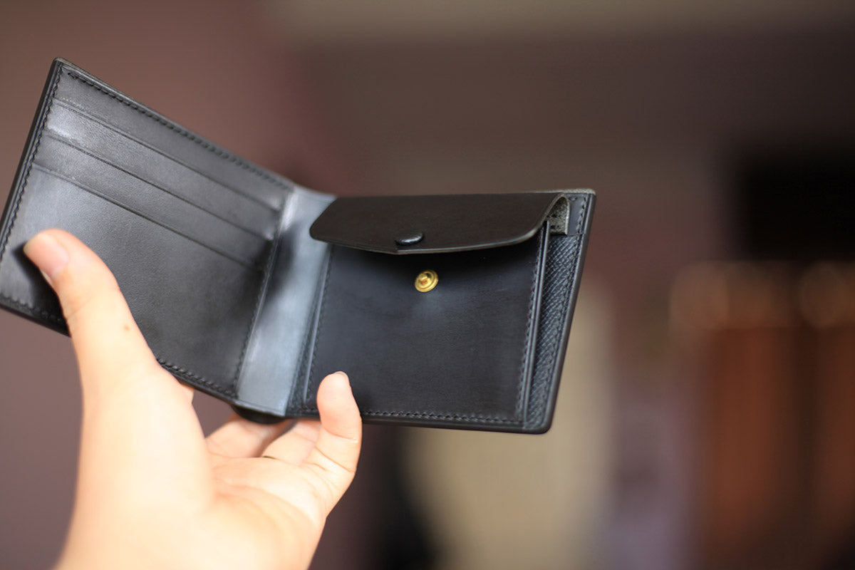 black buttero leather bifold wallet