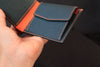 black orange leather wallet with coin pocket