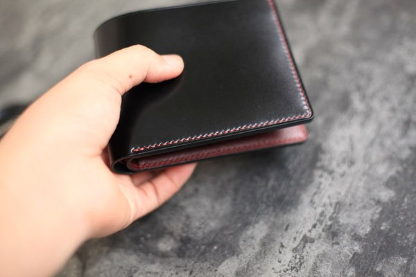 black shell cordovan bifold wallet
