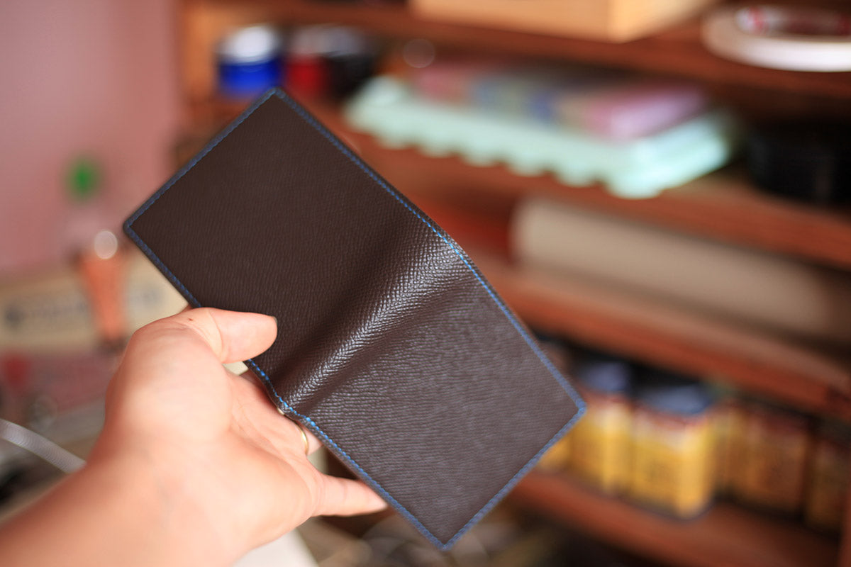 brown and blue epsom leather bifold wallet