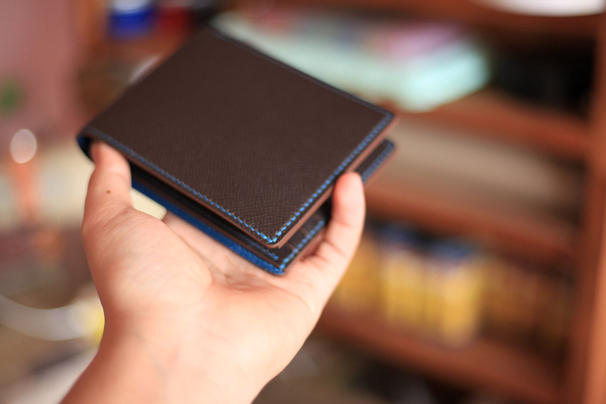 brown blue epsom leather bifold wallet