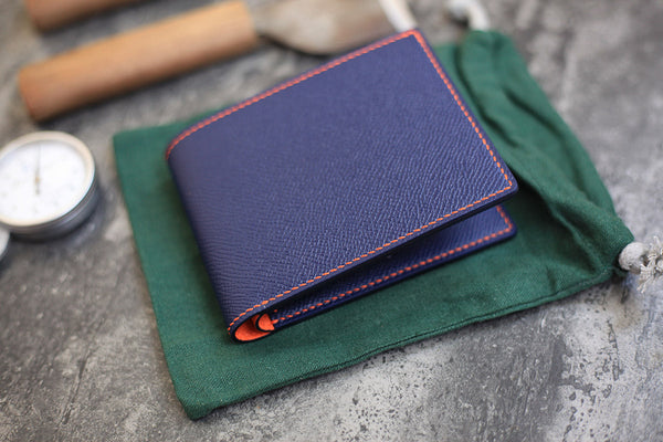 dark blue orange epsom leather bifold wallet