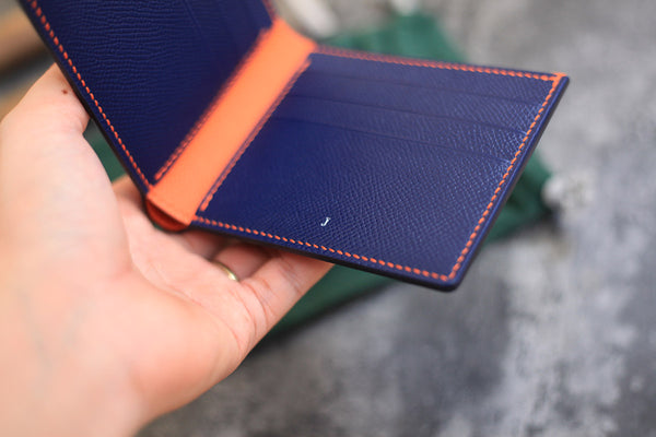 dark blue orange leather bifold wallet