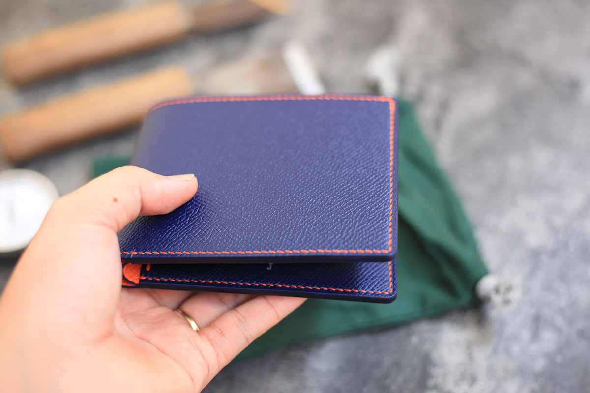 epsom leather bifold wallet dark blue orange color