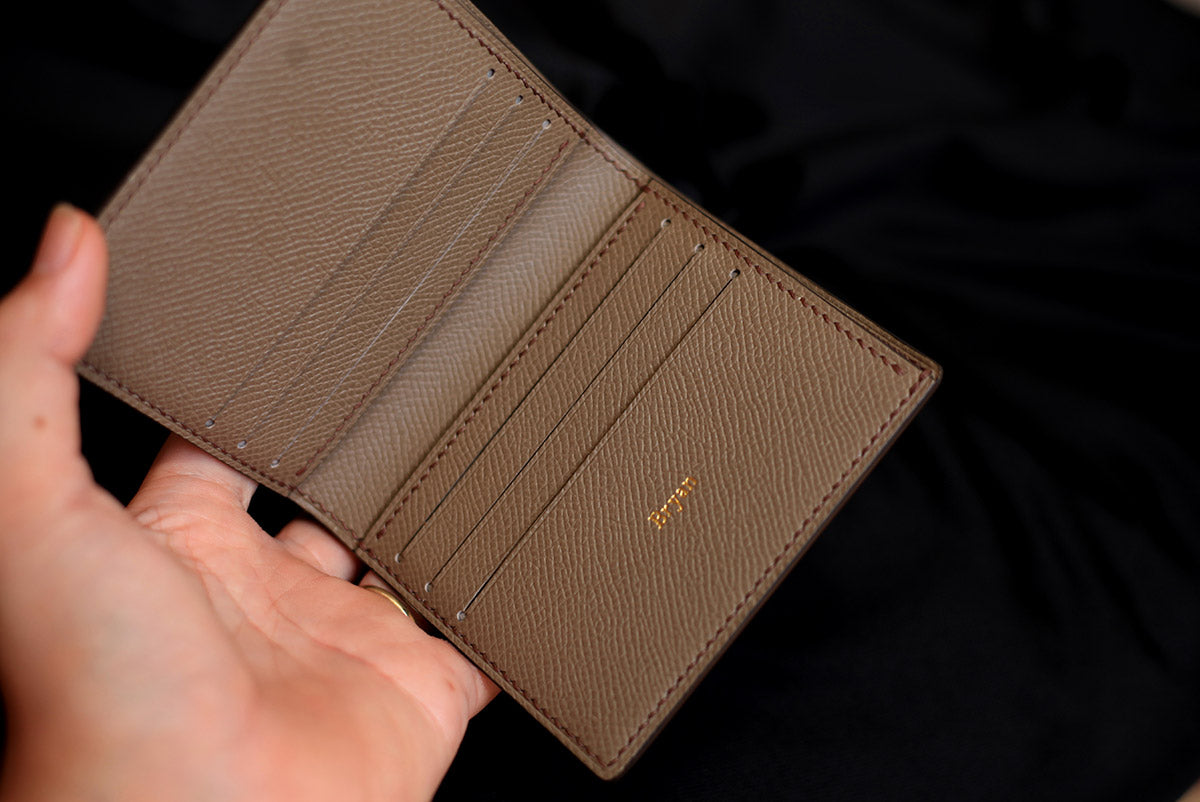 brown bifold wallet