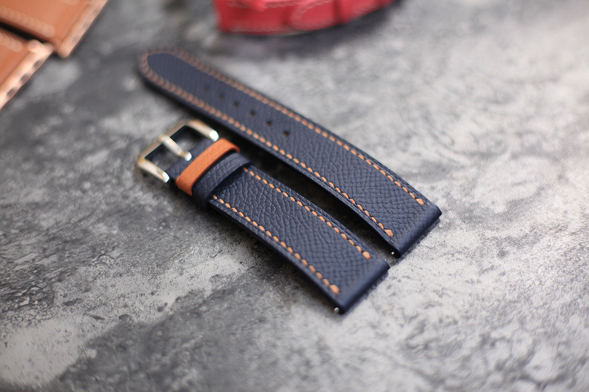 navy blue omega watch strap with orange stitching